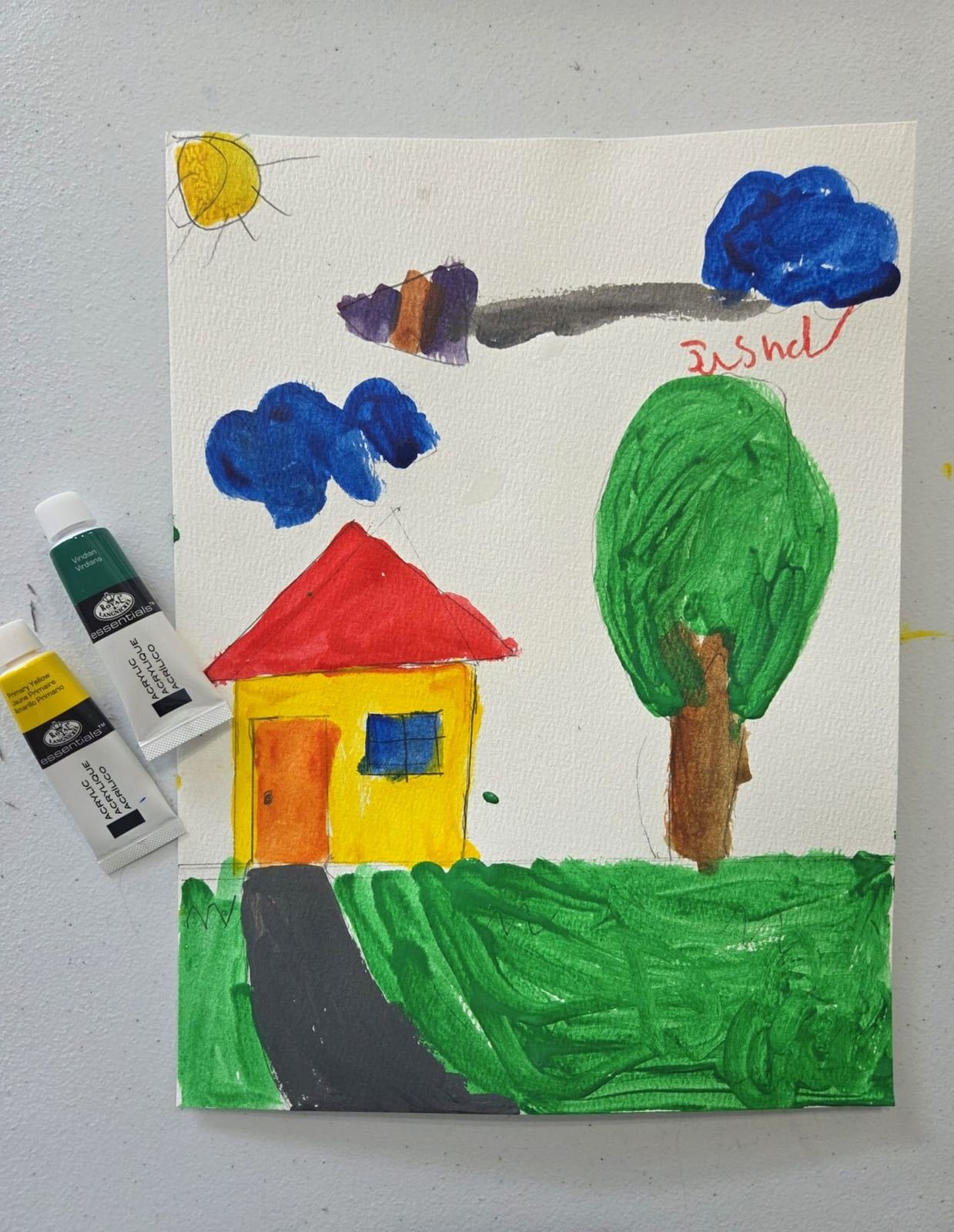 Student painting of a house and tree, signed Jisshan