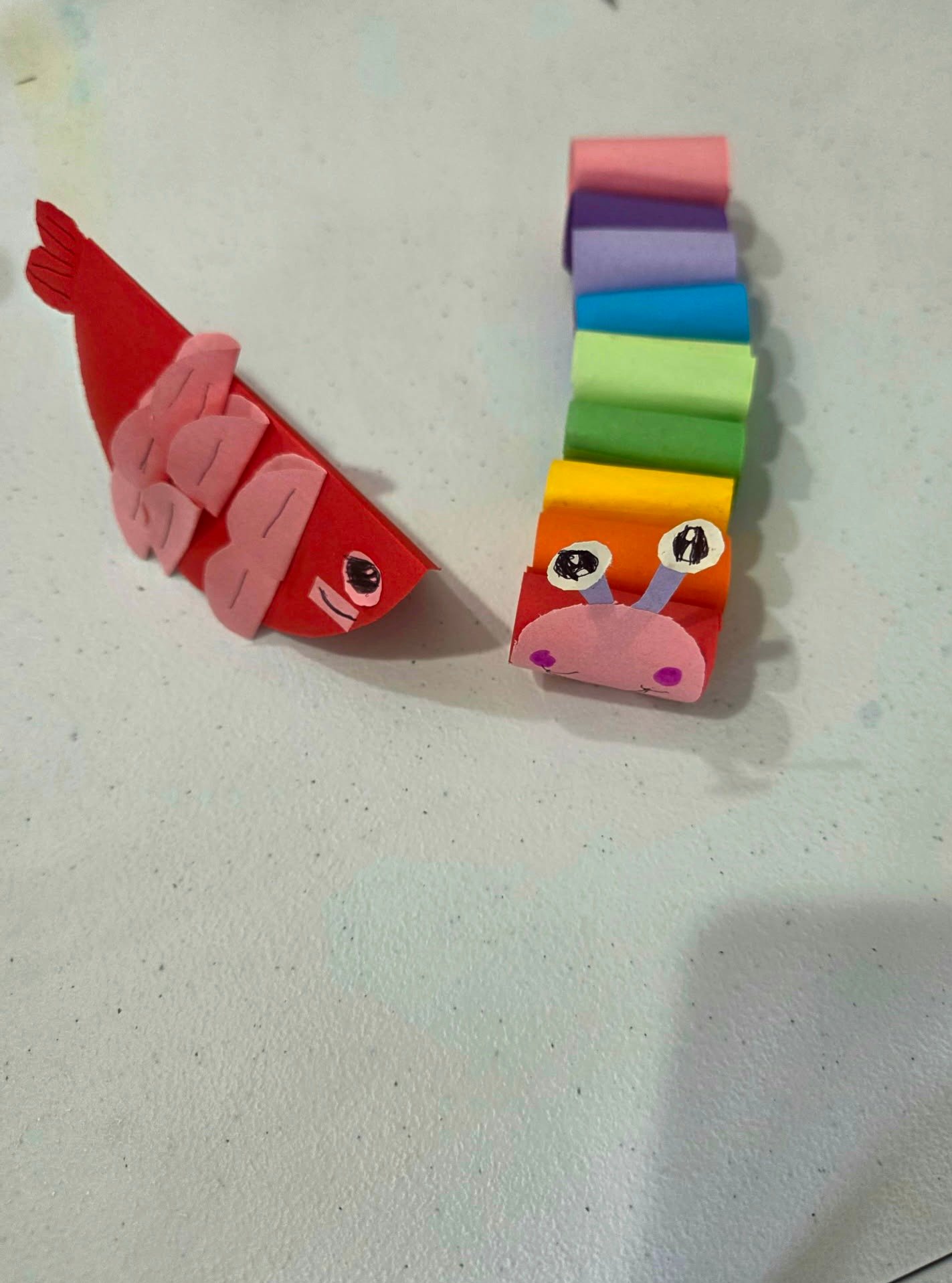 Student Paper Hand Craft — paper fish and caterpillar creations